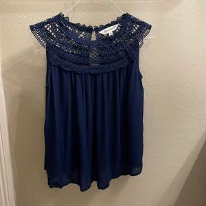 Navy blue sleeveless blouse